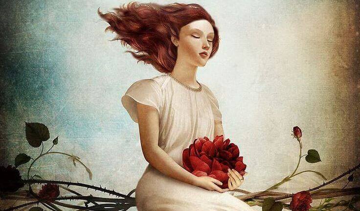 mulher-com-flores Mulher com flores representando pessoas que enxergam com o coração