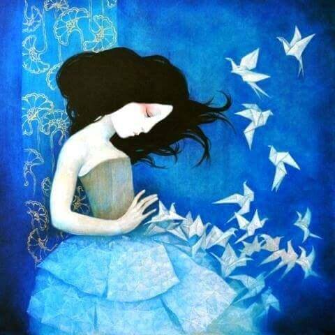 mulher-com-passarinhos-de-papel