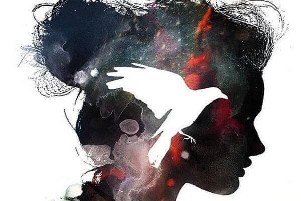 perfil-feminino-com-passaro