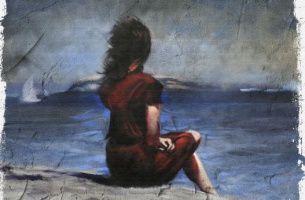 menina olhando o mar