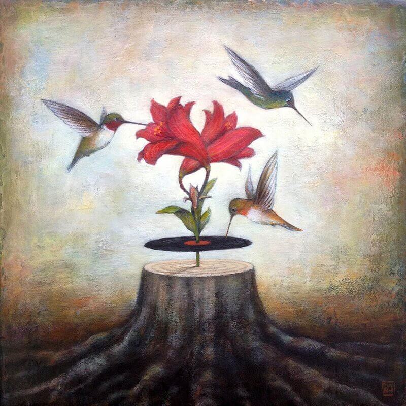 Pássaros voando ao redor de uma flor