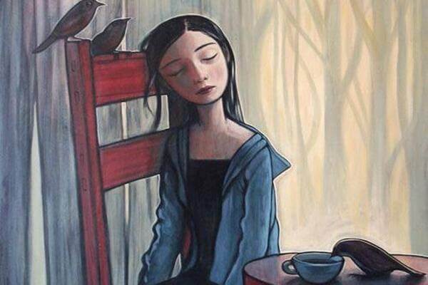 menina-sentada-com-expressão-triste