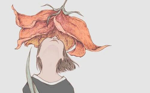 menina-olhando-flor