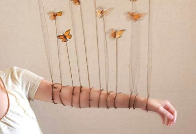 borboletas-presas-braço