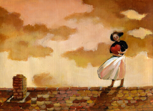 Mulher segurando coracao em telhado