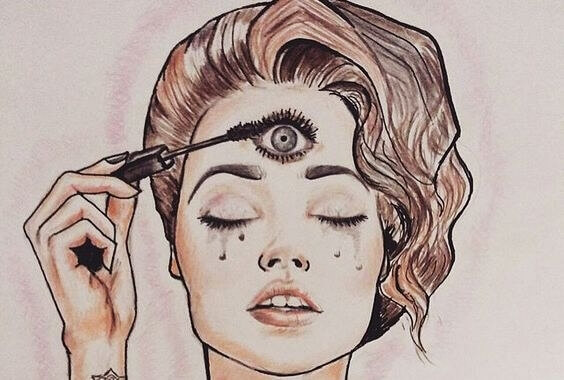 Mulher maquiando terceiro olho