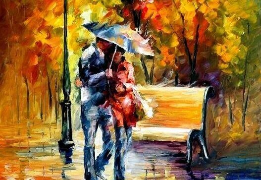 Casal apaixonado passeando na chuva