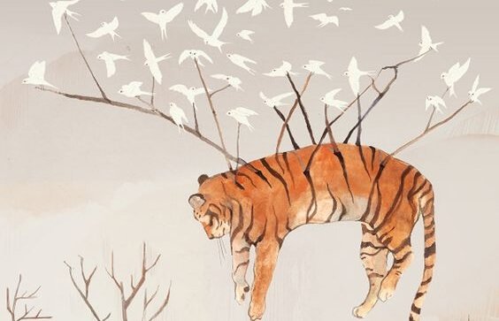 Tigre carregado por passaros