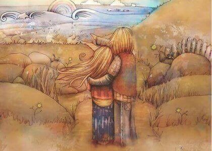 Casal apaixonado observando o mar