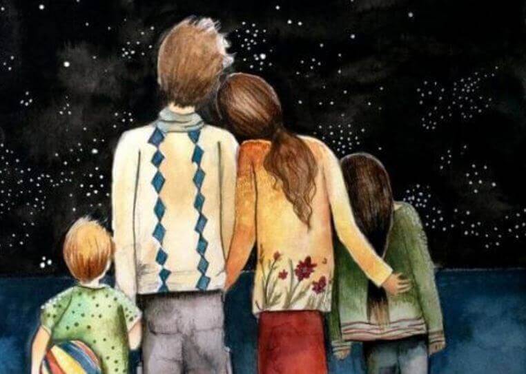 Família unida observando as estrelas