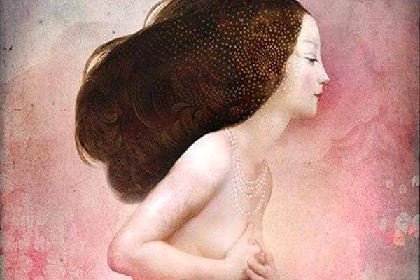 Mulher nua com as mãos nos seios