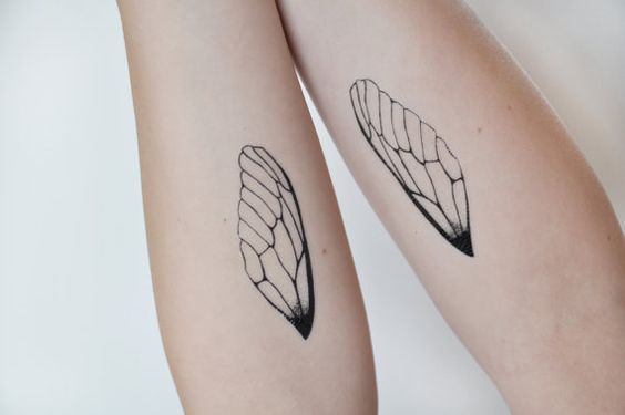 Tatuagens de asas em braços