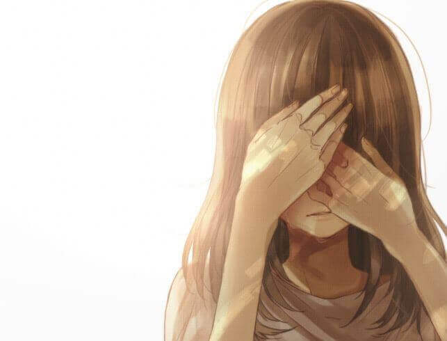 Menina cobrindo seu rosto