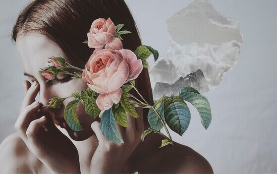 Mulher com flor no rosto