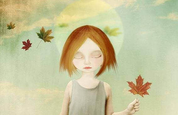 Menina segurando flor de outono