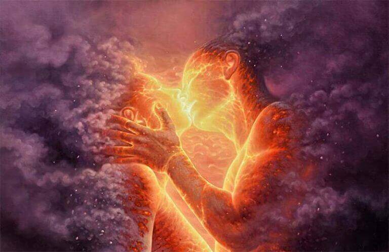 Homem e mulher de fogo se beijando