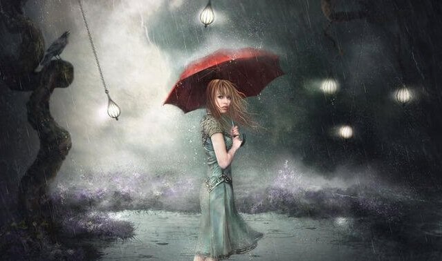Mulher com guarda-chuva na chuva
