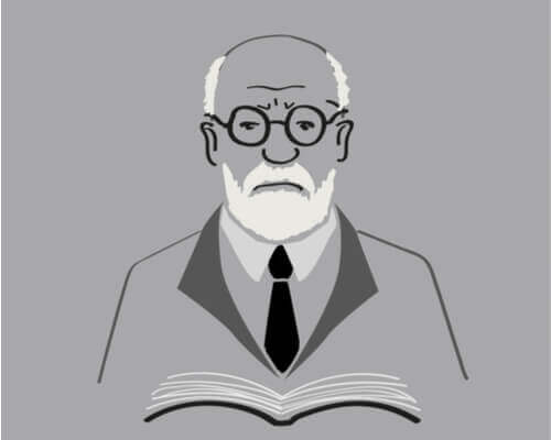 Freud segurando um livro