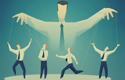 Homem manipulando fantoches