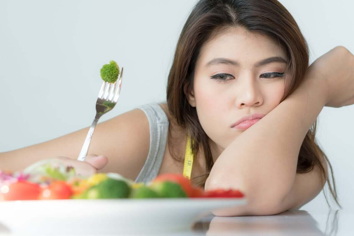 Mulher sem vontade de comer